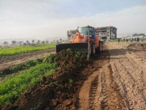 إزالة تعديات عن قطع أراضٍ بمدينة سوهاج الجديدة في حملات مكبرة